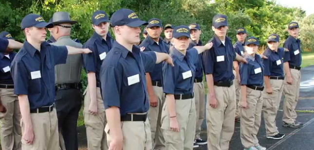 Students in two uniformed lines 
